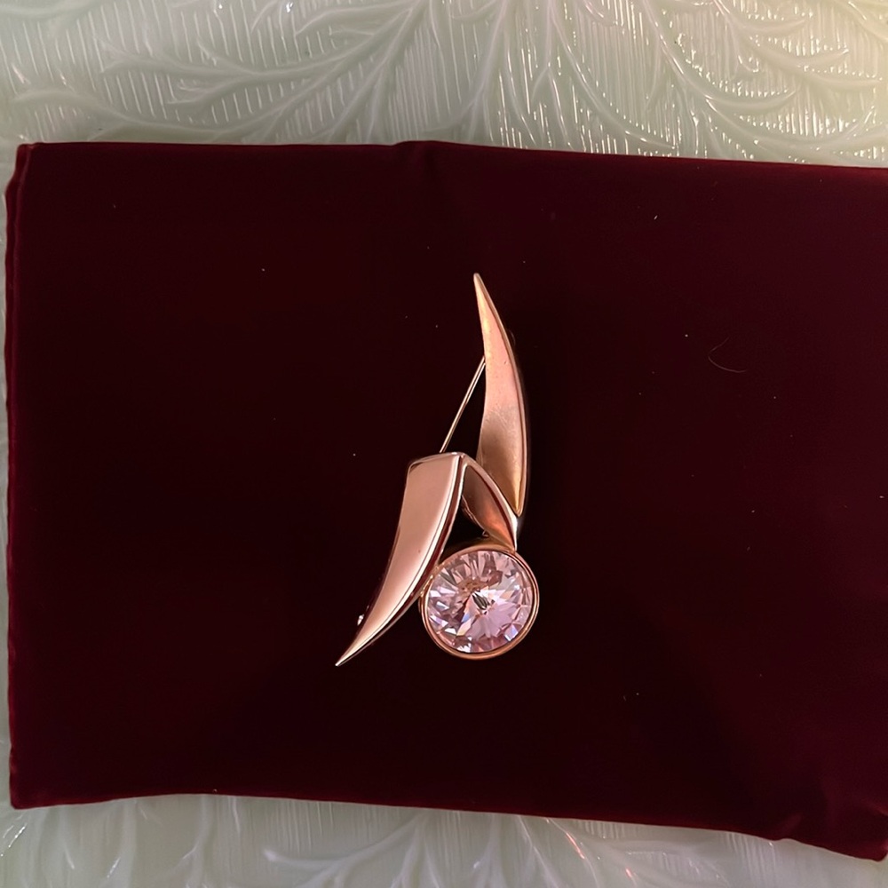 P.E.P. Gold tone brooch with large rhinestone